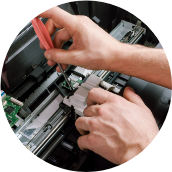 Wrentix Technologies technician servicing a printer